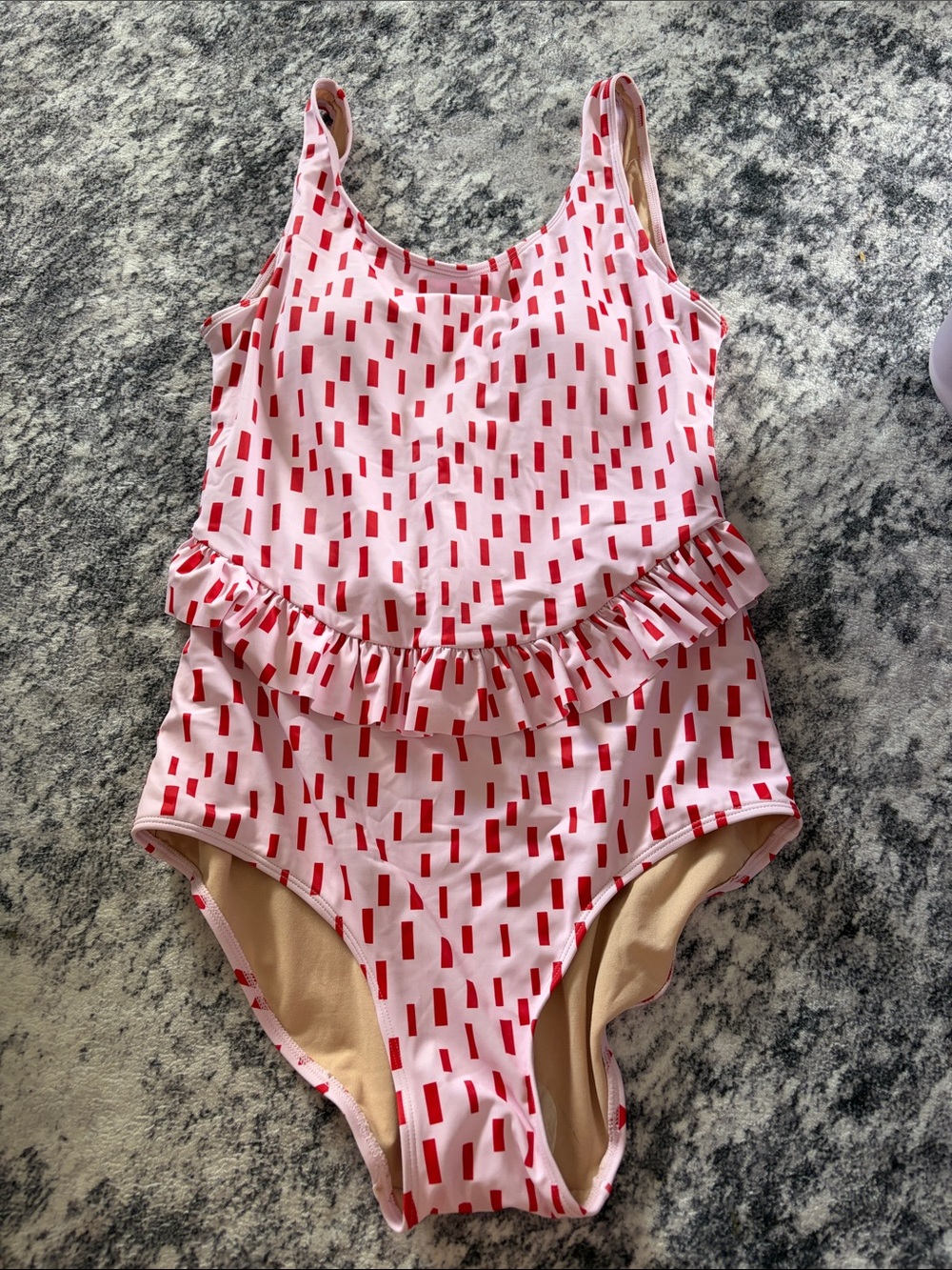 Girls Pink One-Piece Swimsuit with Red Geometric Print and Waist Ruffle